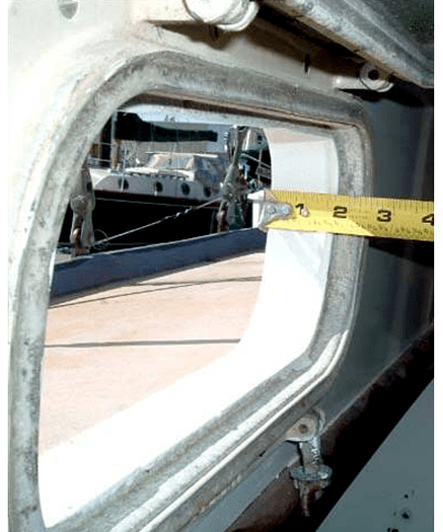 image of measuring cabin-side thickness from the inside of your boat