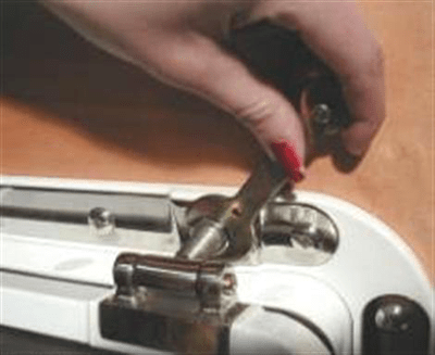 image of step 15b re-adjusting top hinges for pressure for Tri-Matrix portlight installation