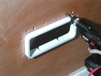 image of step 5 counter bore post holes for Tri-Matrix portlight installation
