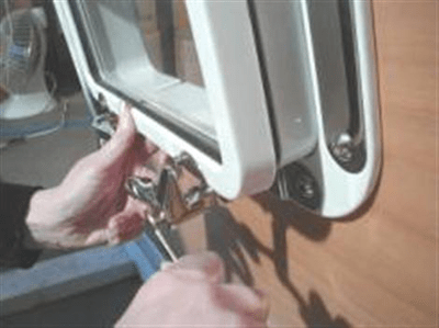 image of step 9a adjusting dog posts for Tri-Matrix portlight installation