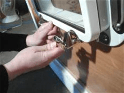 image of step 9b adjusting dog posts for Tri-Matrix portlight installation