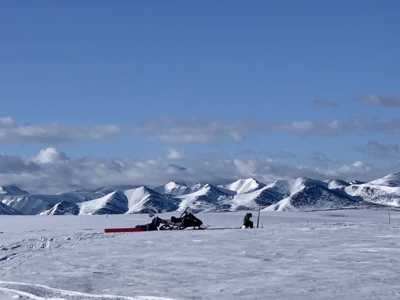A student takes notes in Arctic Alaska.