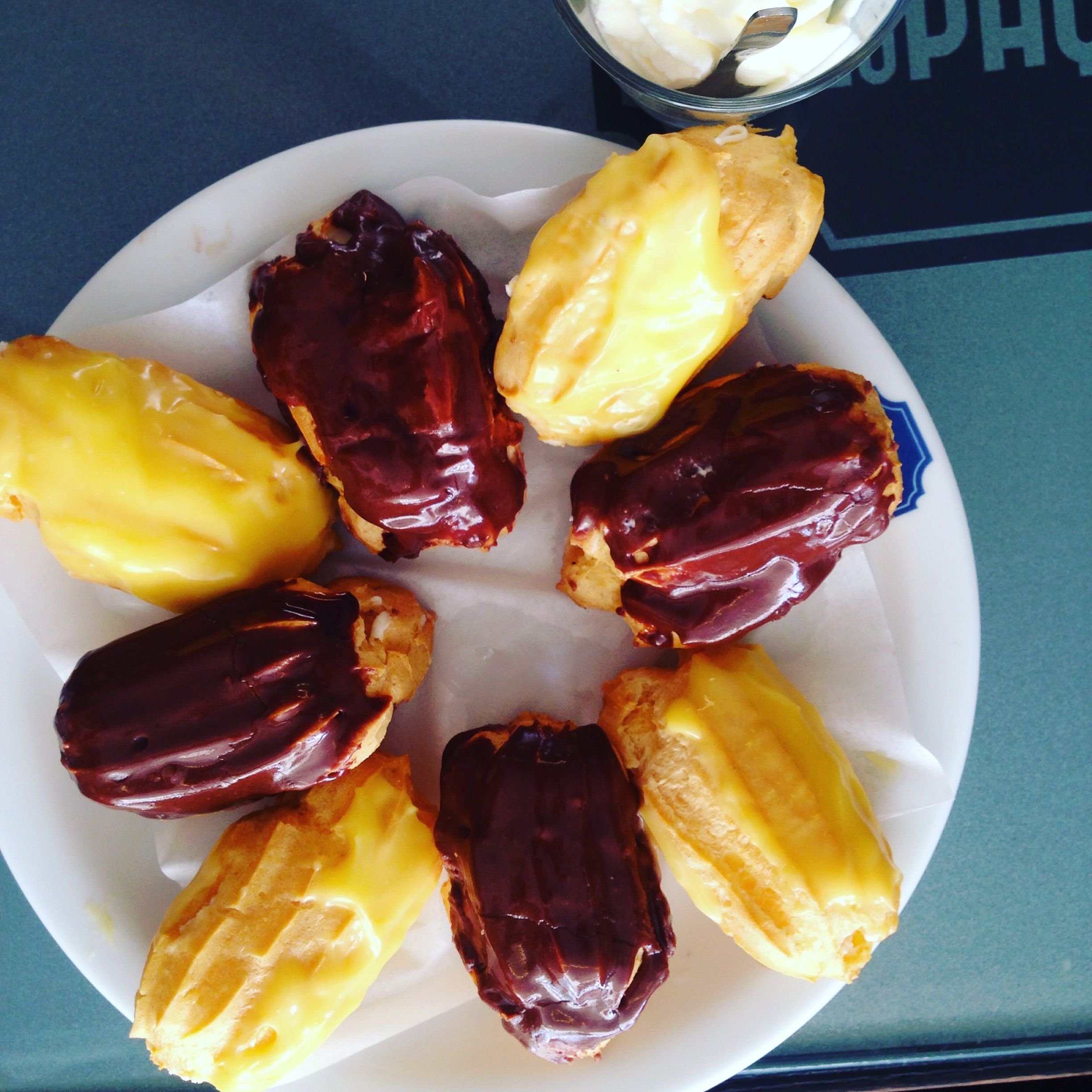 Lemon and chocolate whipped cream filled eclairs at Leitaria da Qta do Paco.