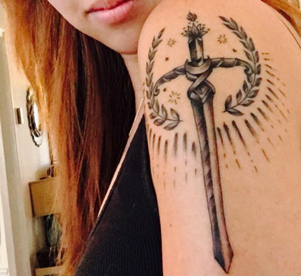 20 Sword Tattoo Motifs And Their Symbolic Which Means - Nexttattoos 551_x_600_jpg