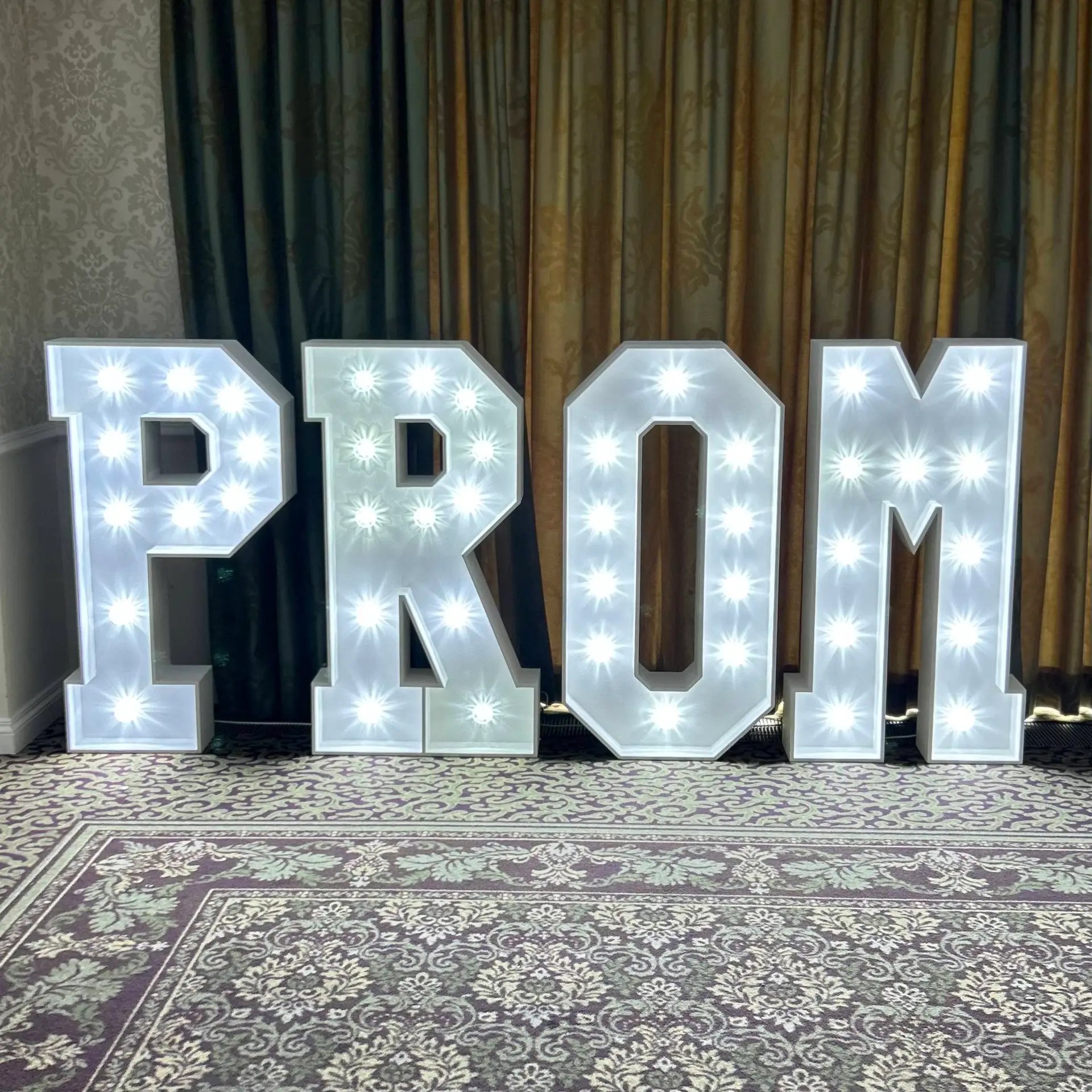 Image showcasing Nextwave Events & Hire's event equipment and services, including LED dancefloor hire, light-up numbers, light-up letters, staging, and special effects for weddings, birthdays, and events.