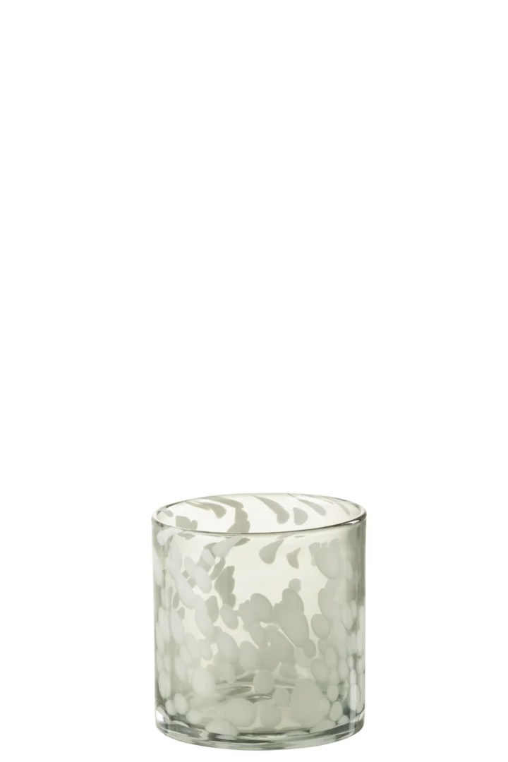 De Kaarsenhouder Orkaan Dot Glas Grijs Wit Klein is een kleine, heldere glazen beker met een ronde vorm en een geëtst wit bloemen- en bladpatroon rond de buitenkant.