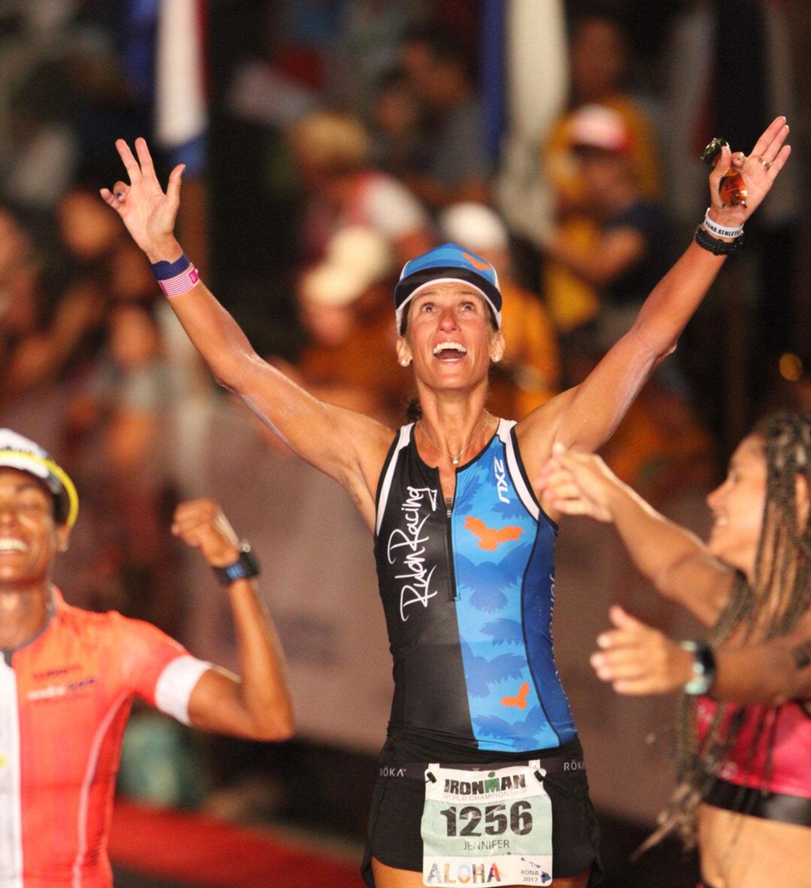 Jen Rulon finishes an Ironman; photo by Finisher Pix