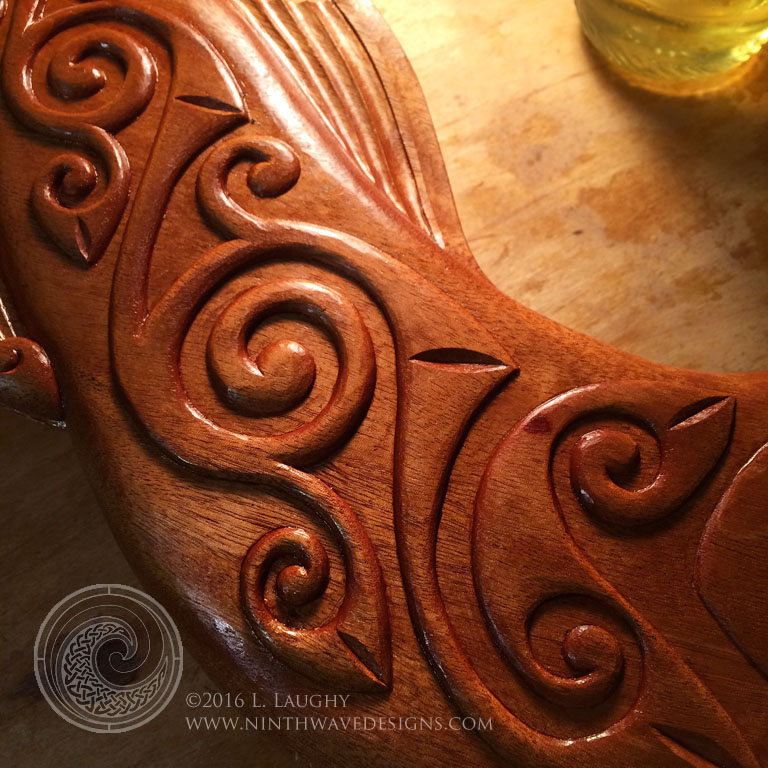 Linseed oil glistens on the wood and brings out the rich color of hte mahogany.