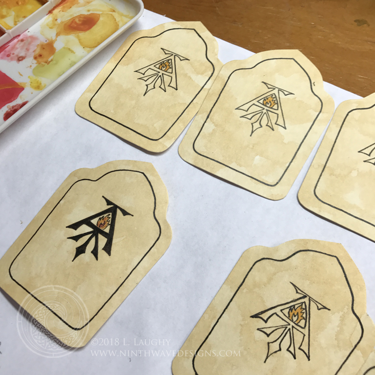 Painting the backs of the cards.