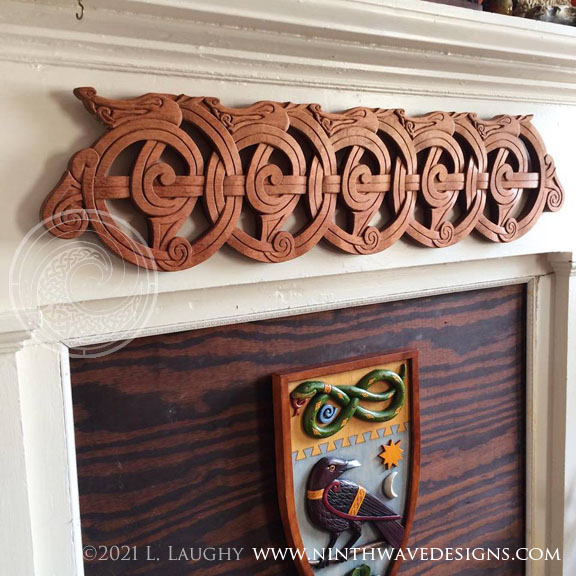 The Dragestil carving hanging on the mantel.