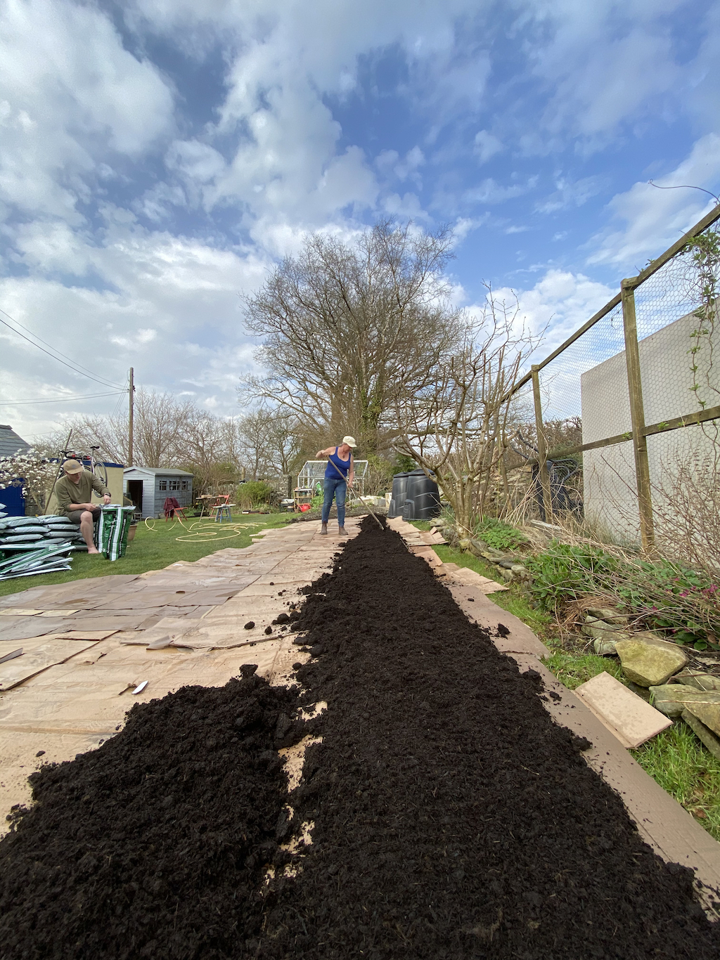 spreading the compost