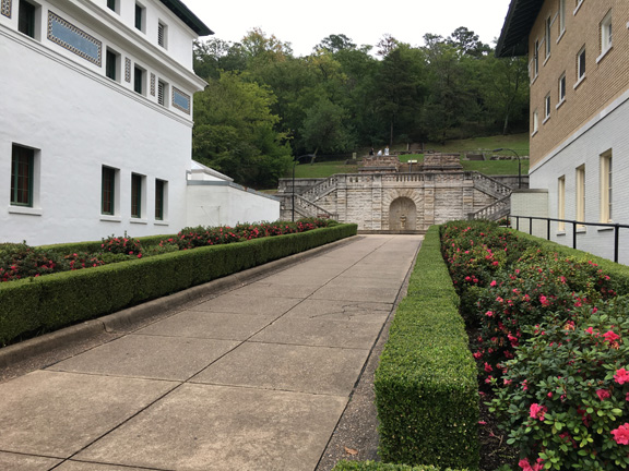 Sidewalk between bathhouses leading to "The Promenade" Note: feature built into wall is a hot water spring, 134º¡