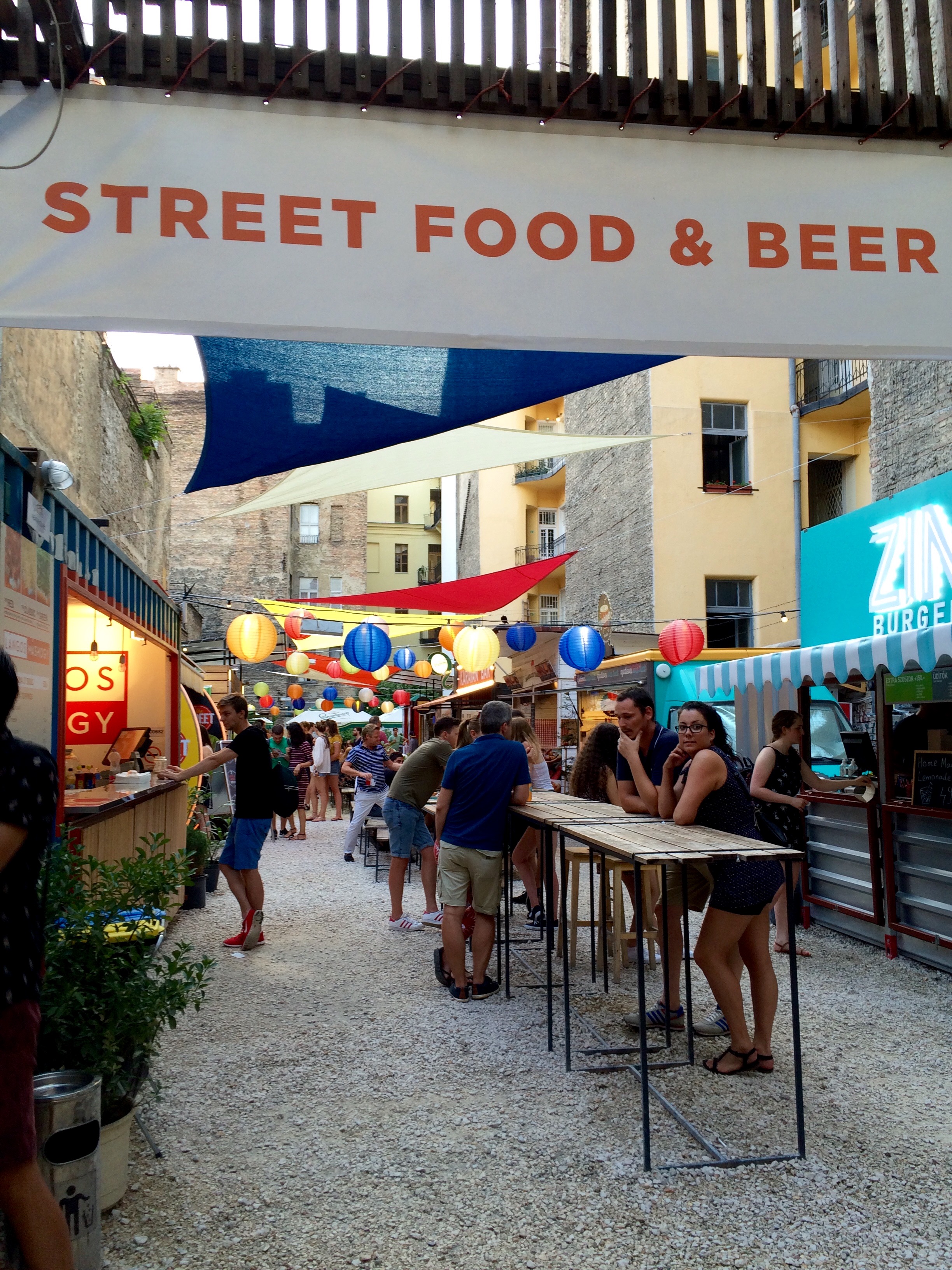 Cheap wine and food in a back alley pop-up