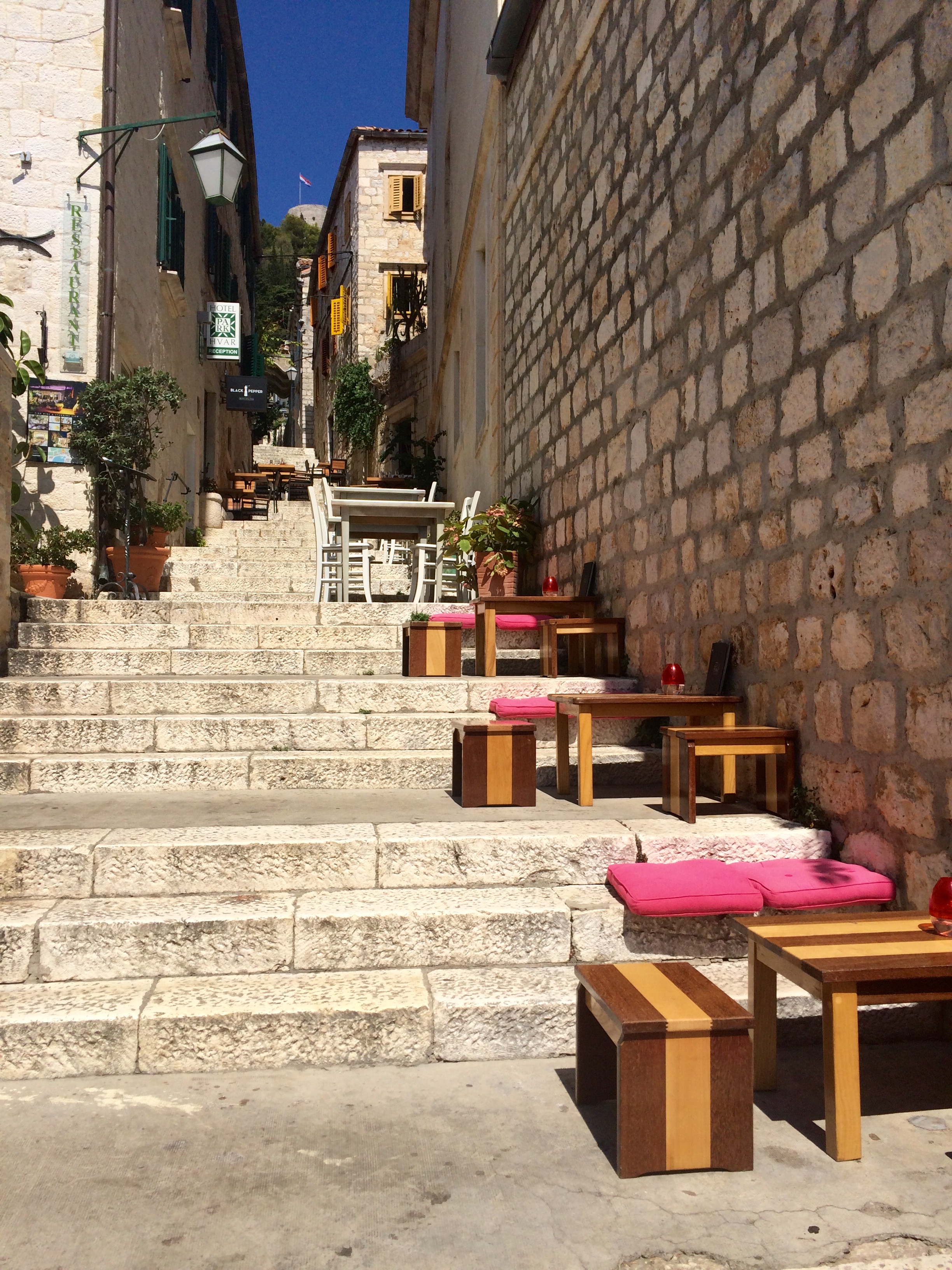 Restaurants and bars line the stairs and alleys