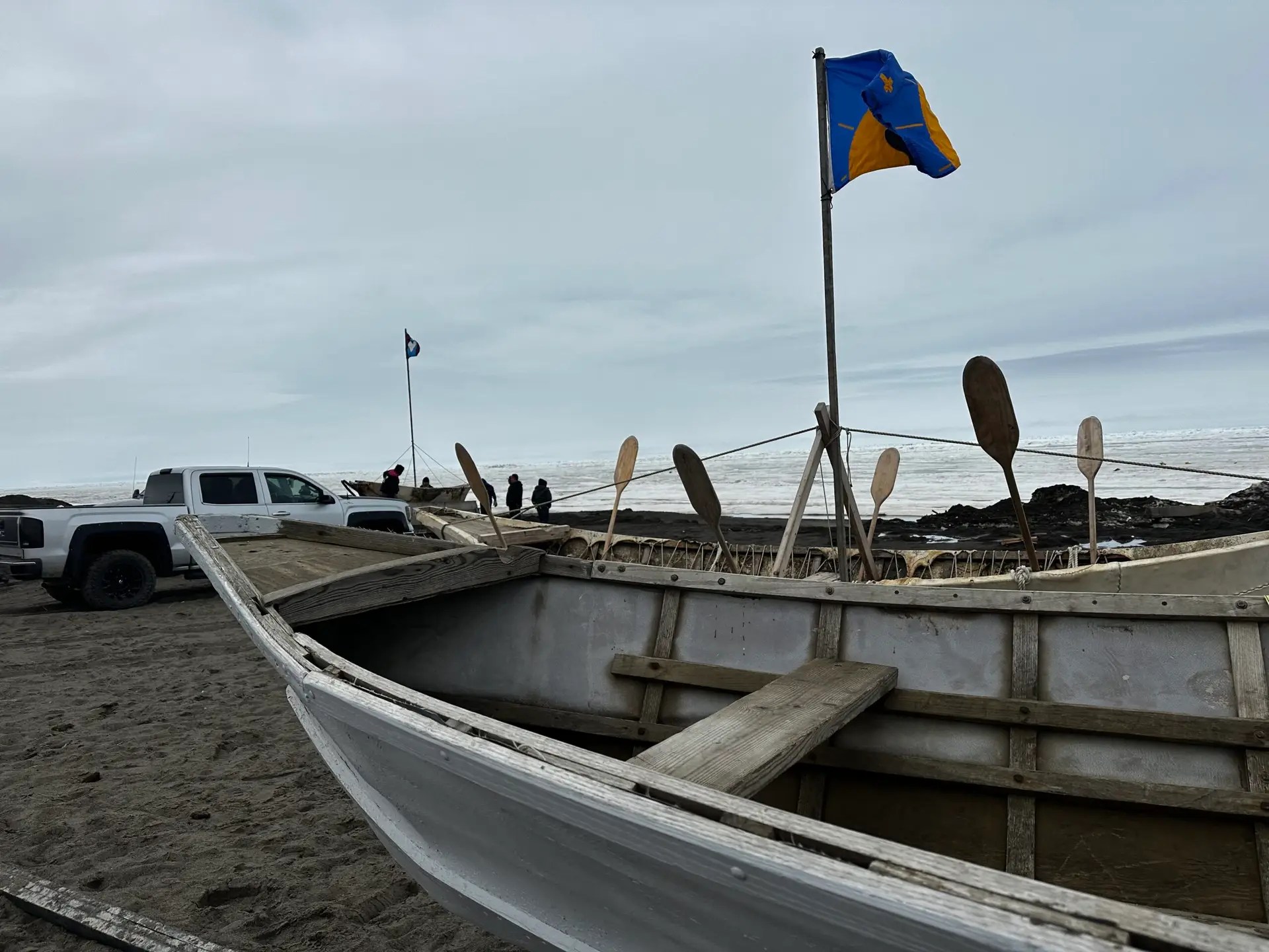 The bear hung around until a whaling crew showed up to pull their boat off the ice.