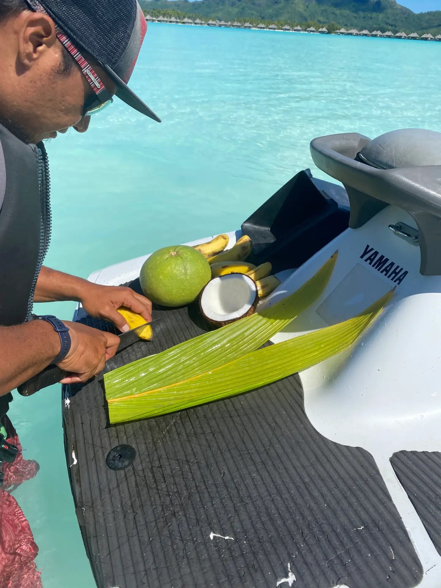 Our guide cutting up fruit for us