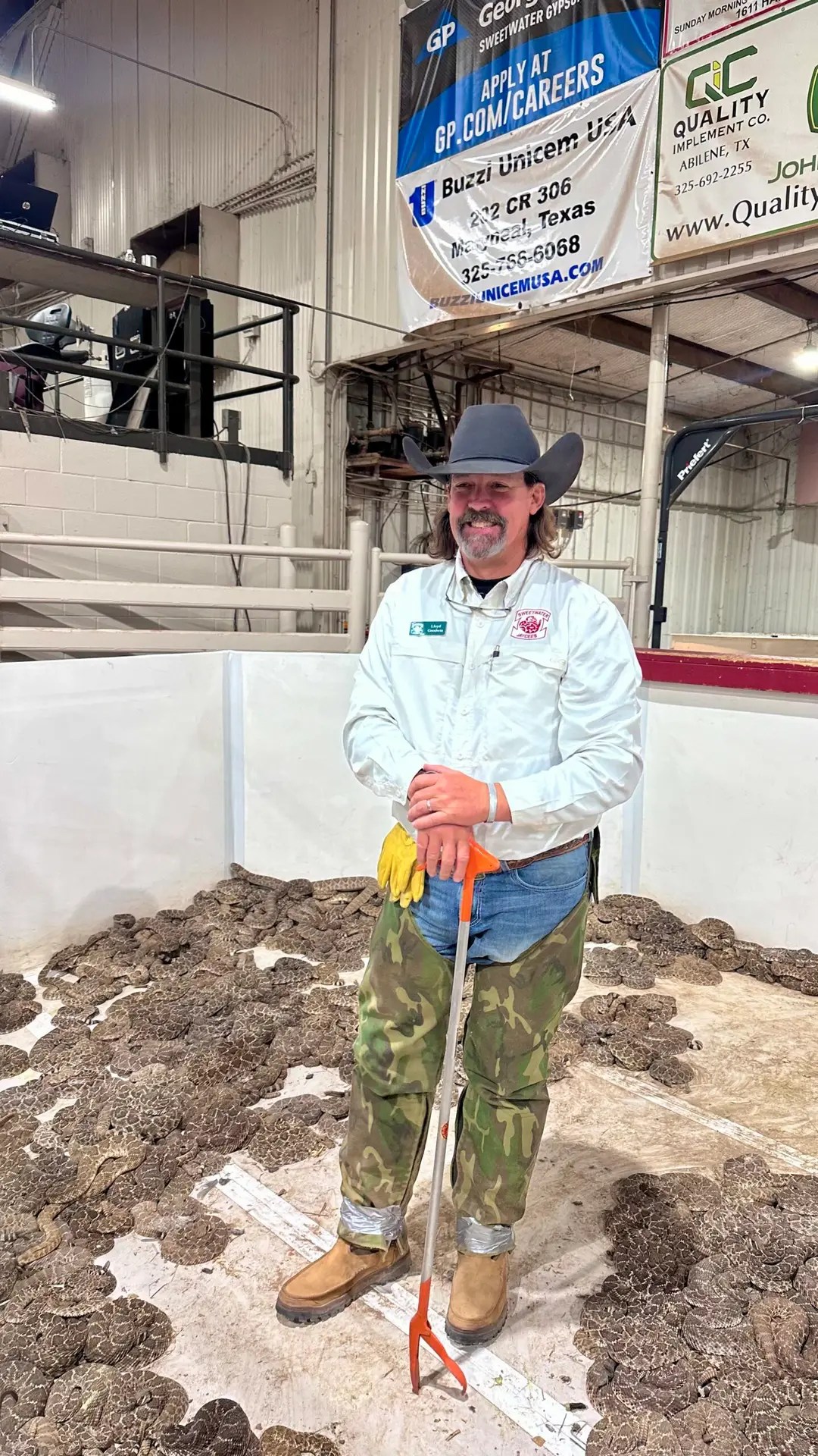 His boots go up to just below his knees. He's 6'2". He said they don't let the short guys in here because they are more likely to get struck.