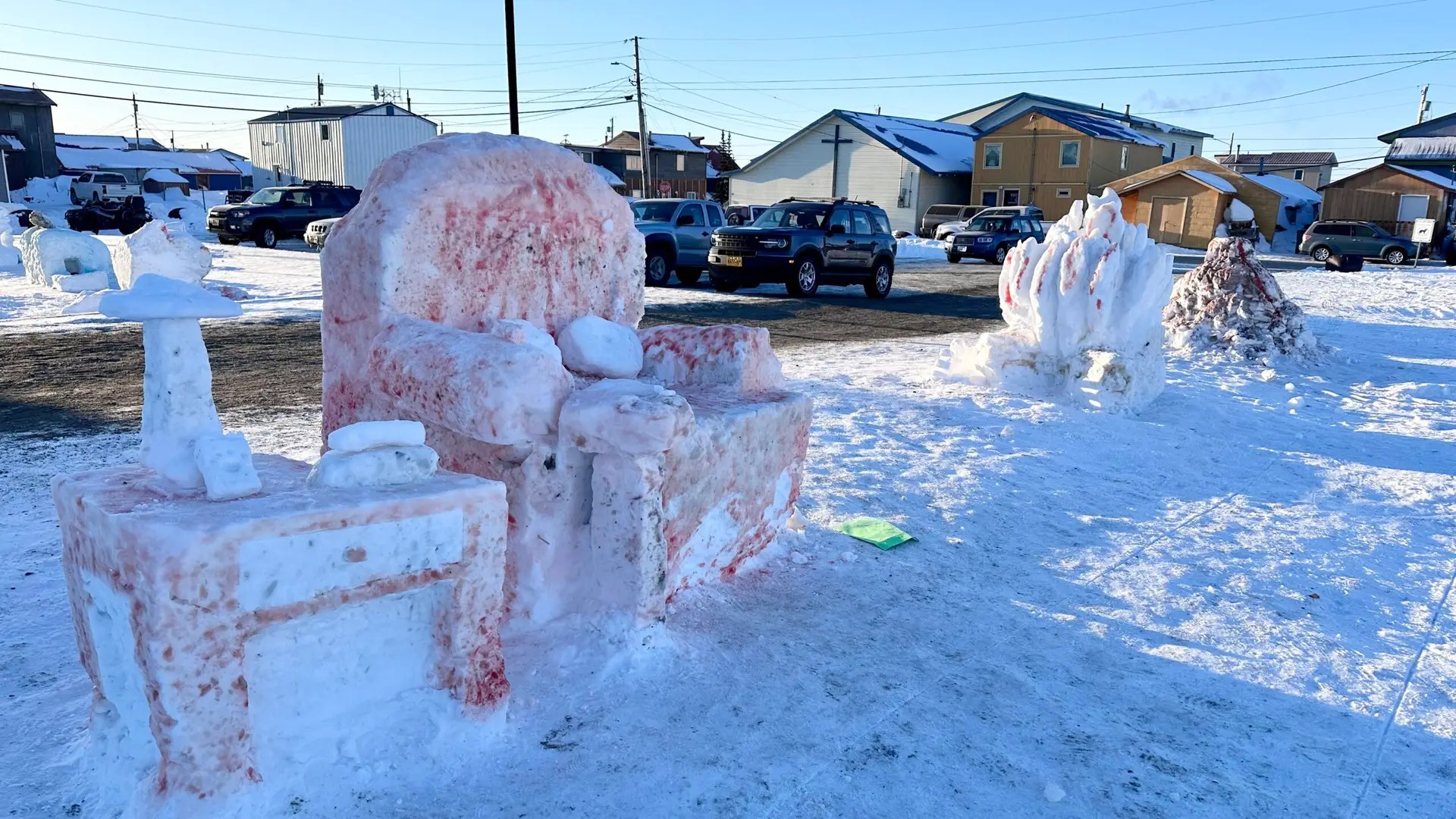 They had a snow scultpting competition at the square. Nine teams of four people had three hours to sculpt.