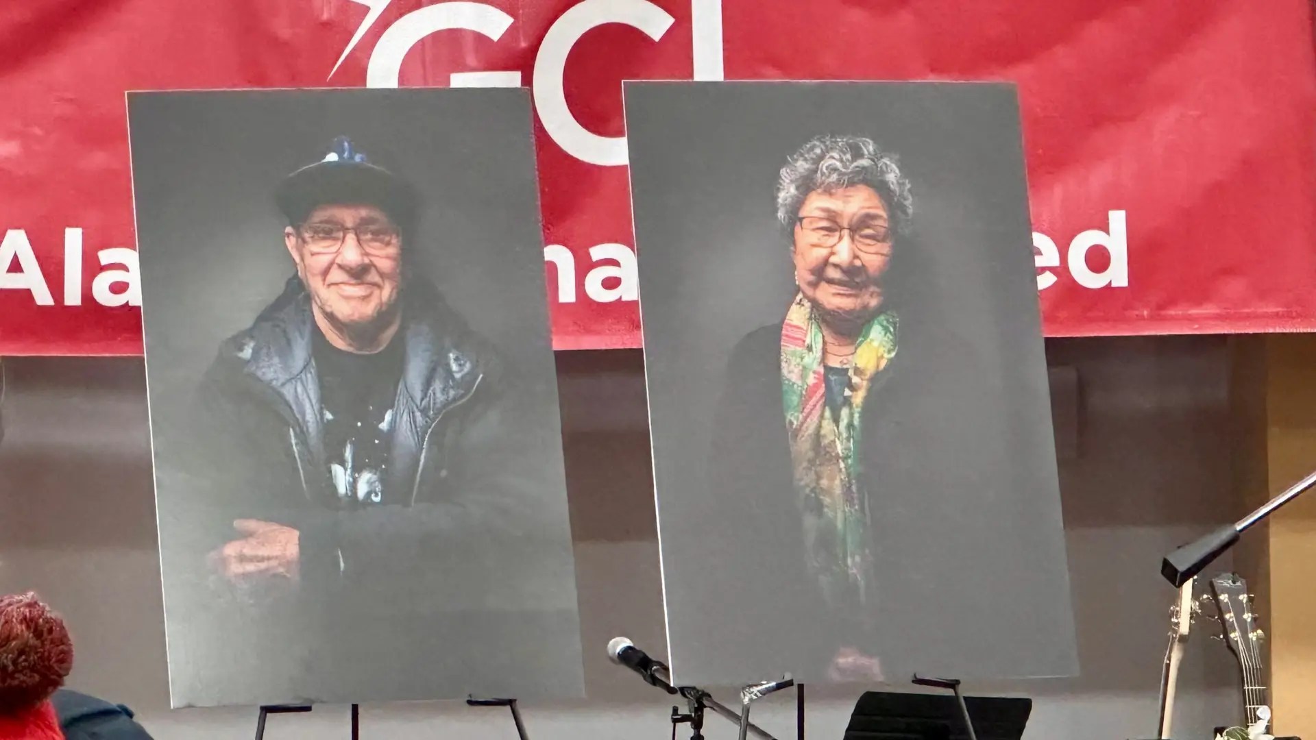 Mr. and Mrs. Farley - their pictures who moved from the museum to the Awards Banquet as the town paid tribute to them