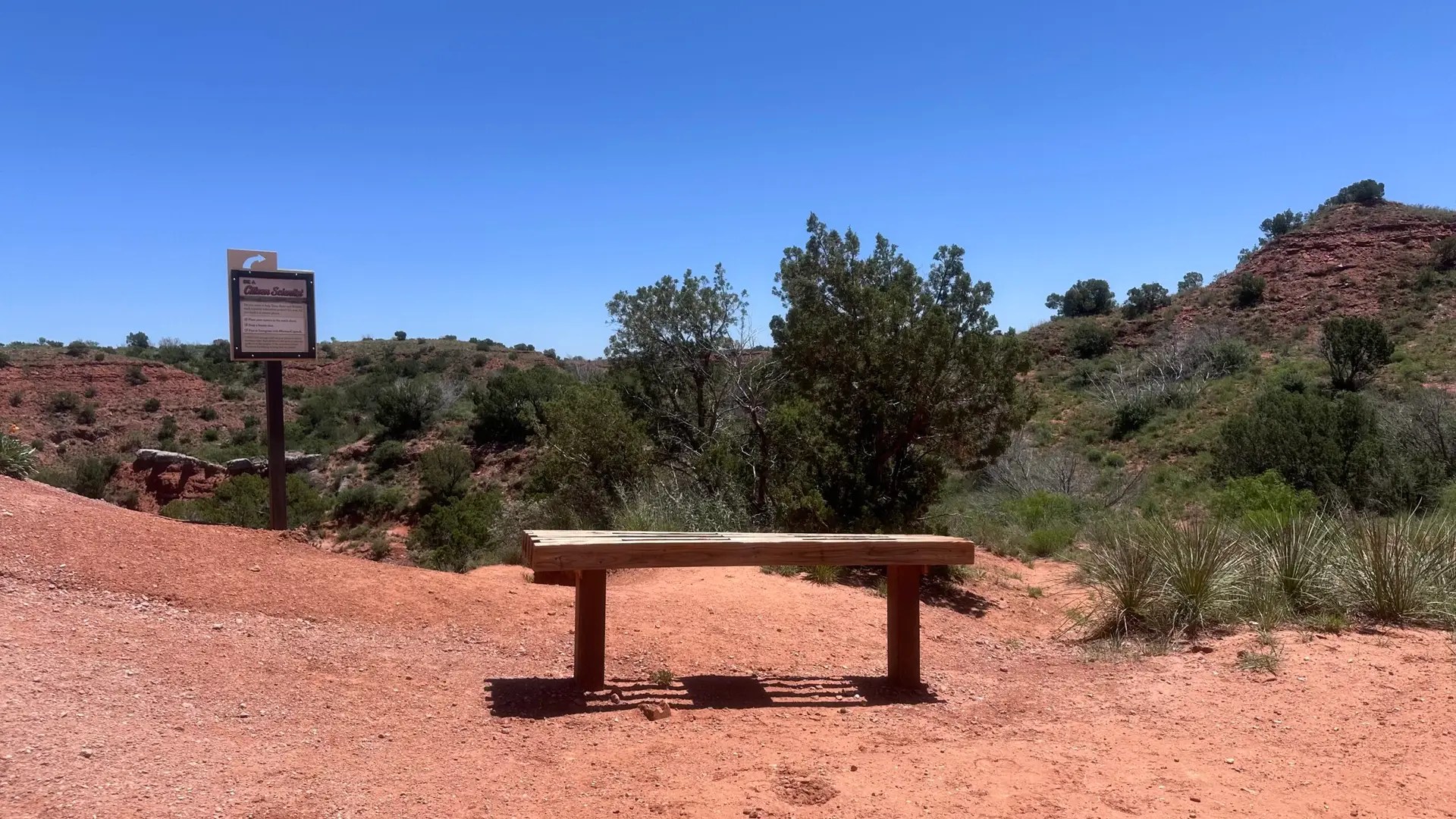 Here’s the bench. I took the trail under it, just like the sign said.