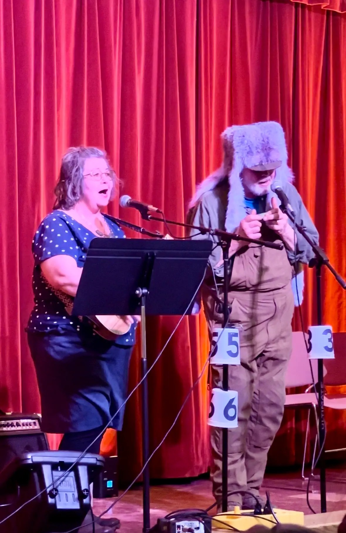 This is Polka Dot and Caribou Jack at the open mic night. Polka Dot teaches at the elementary school.