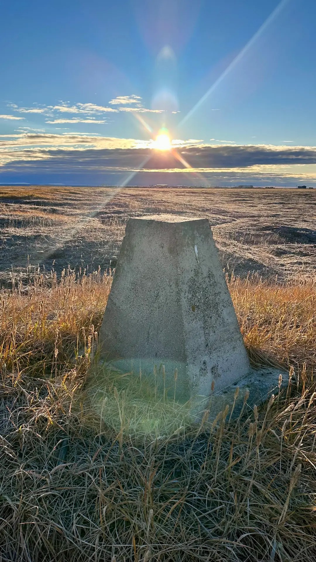 This marks where the Iputak people lived. Iputak refers to a culture that predates the Inupiat. This rock is called Tikigak, which is also the Inupiat name for Point Hope.