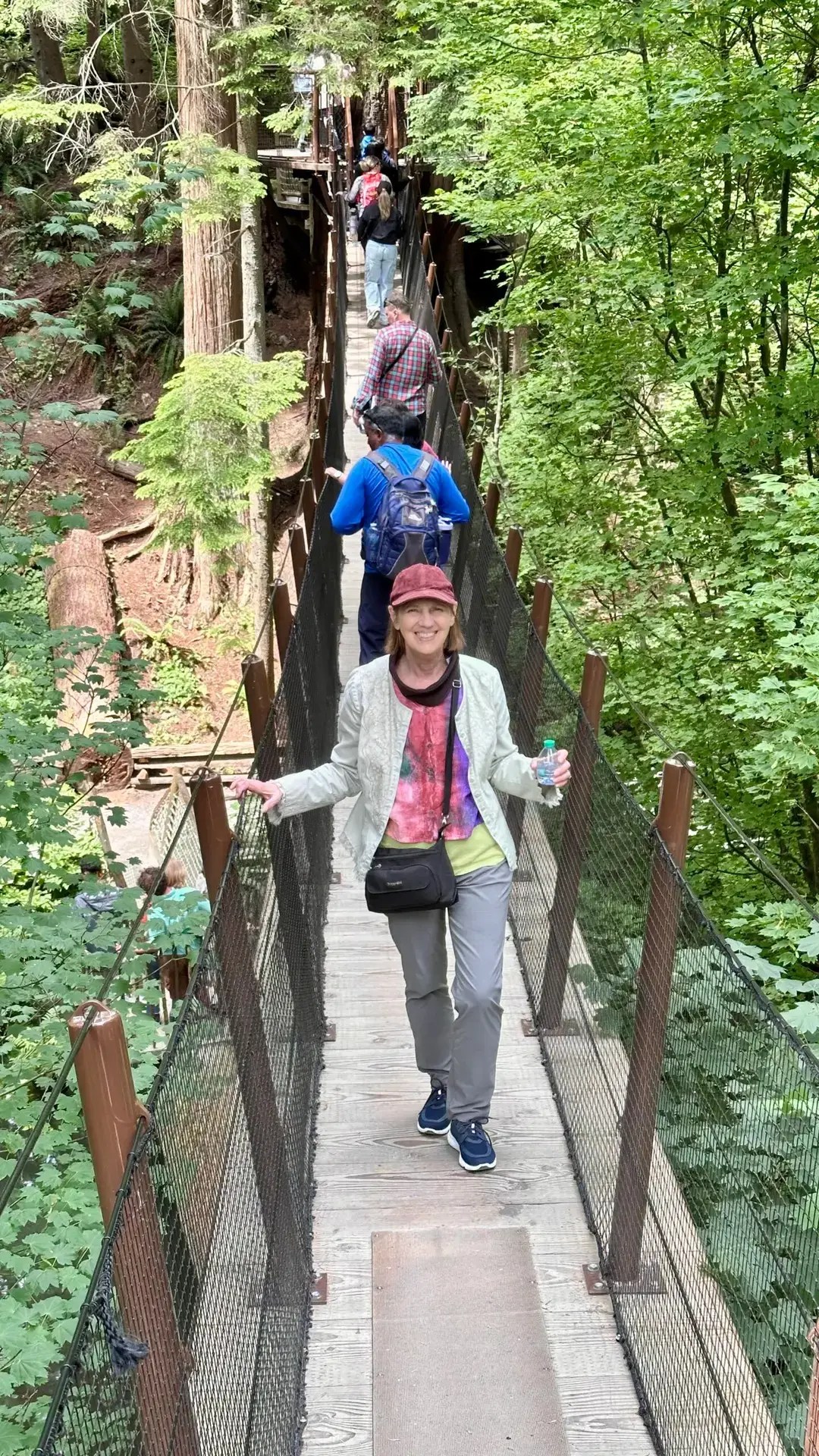 Mom on a Treetops Adventure path