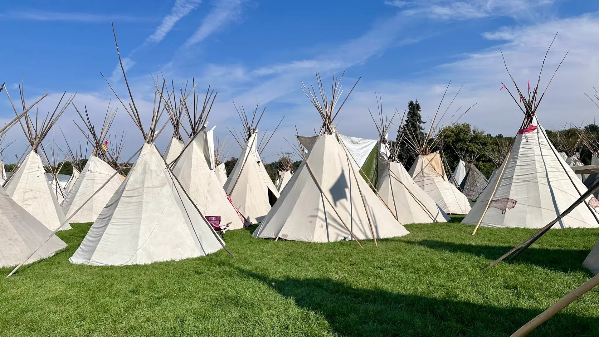 Teepees set up on the rodeo grounds