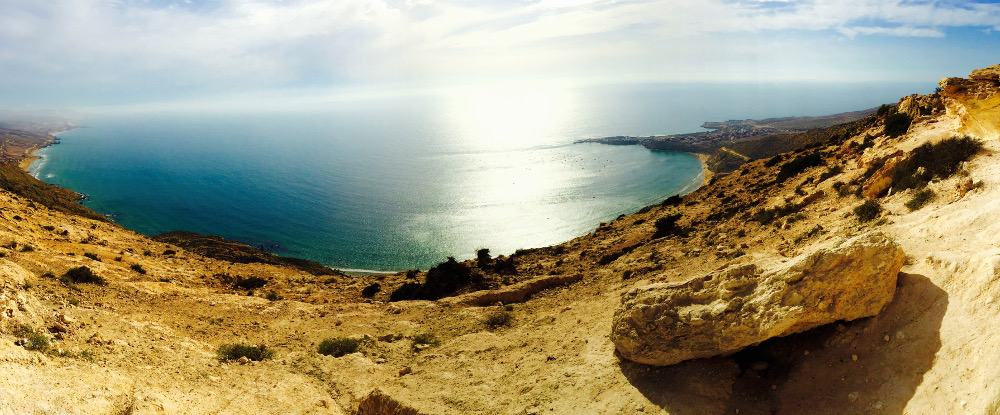 A panoramic view of the ocean from land