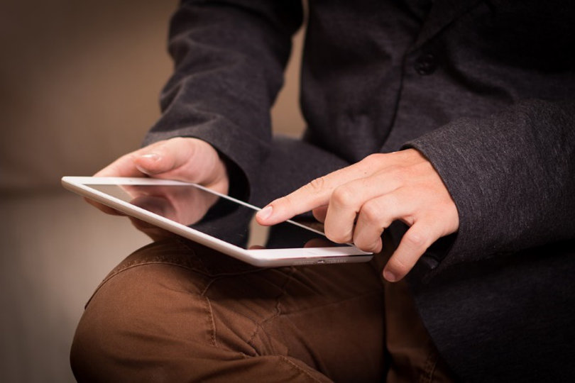 Businessman using tablet PC