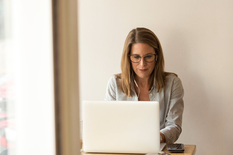 Businesswoman using Bacs software