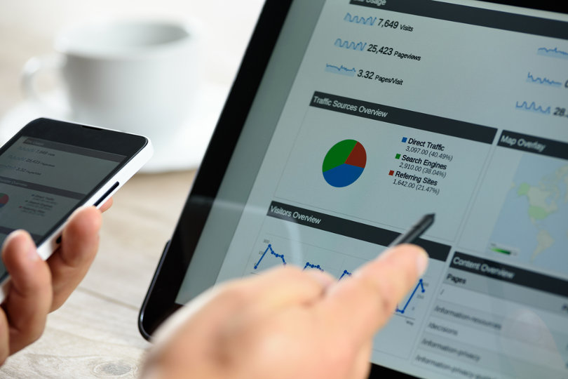 SEO specialist analyzing Google Analytics