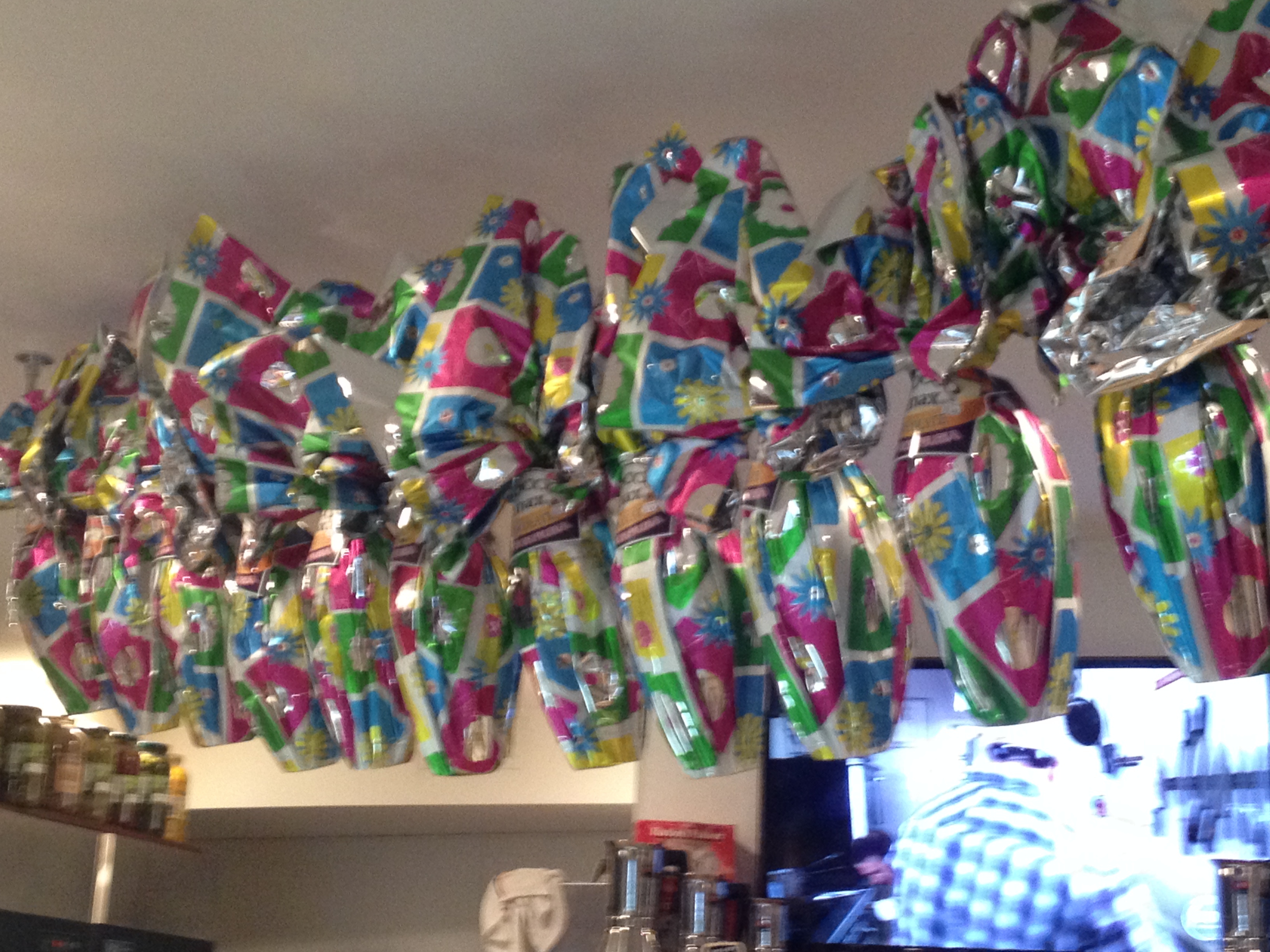 Zig-zagging across the ceiling at the new location of DiPasquale's Pasta Shoppe are dozens of hollow Easter eggs.