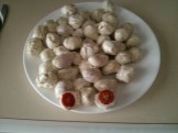 Tomatoes wrapped with dill mozzarella.