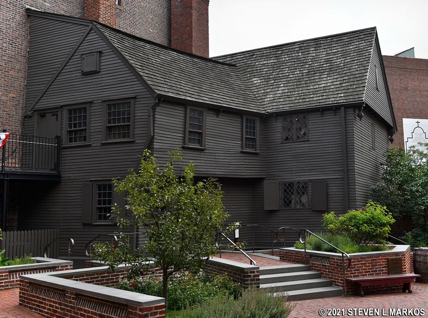 Bronze medallion with words the freedom trail boston set in a red brick. Boston National Historical Park Paul Revere House