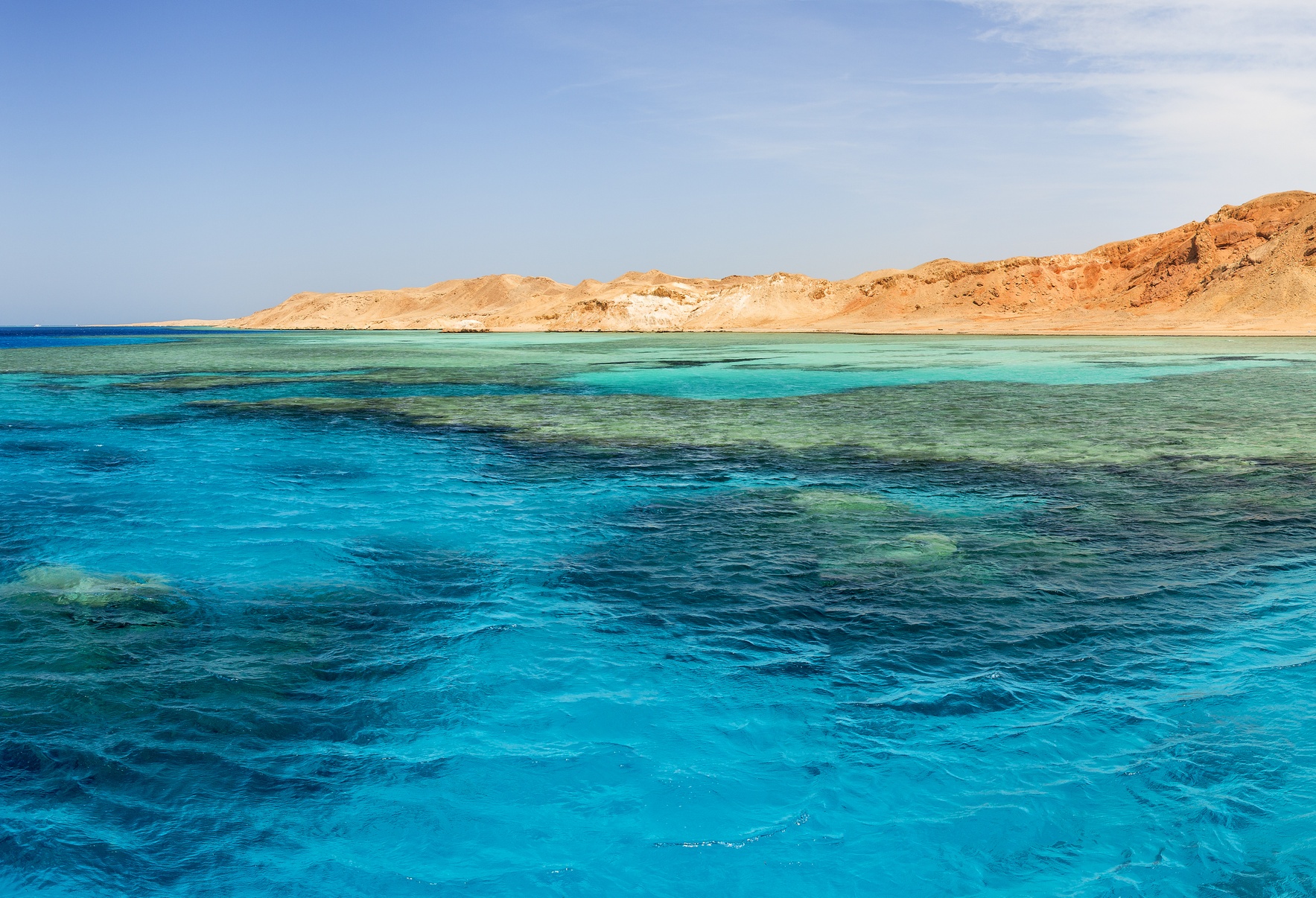emerald water in red sea and yellow sea side