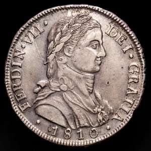 Fernando VII (1808-1833). 8 reales. 1810. Santiago. FJ. (Cal-1403). Ag. 26,88 gramos. Busto almirante laureado. Casaca sin botones. EBC. Suave pátina. Rara.