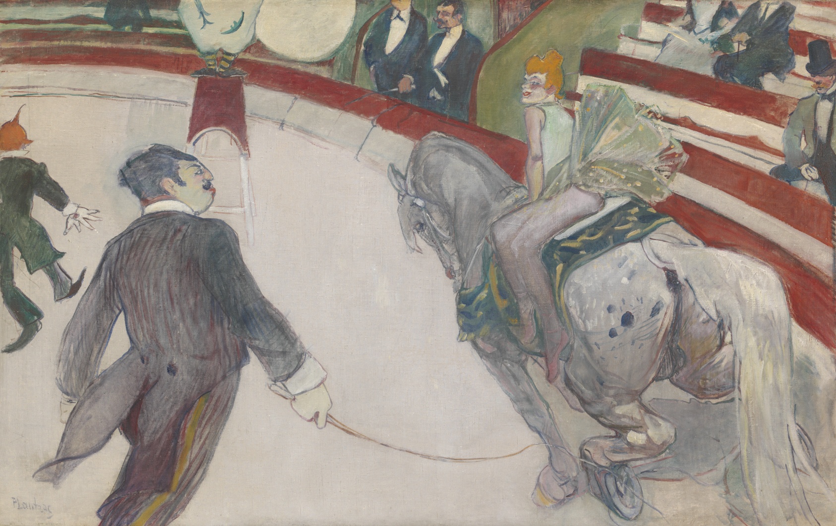 An image of a woman on a horse and a man lading the horse around an arena