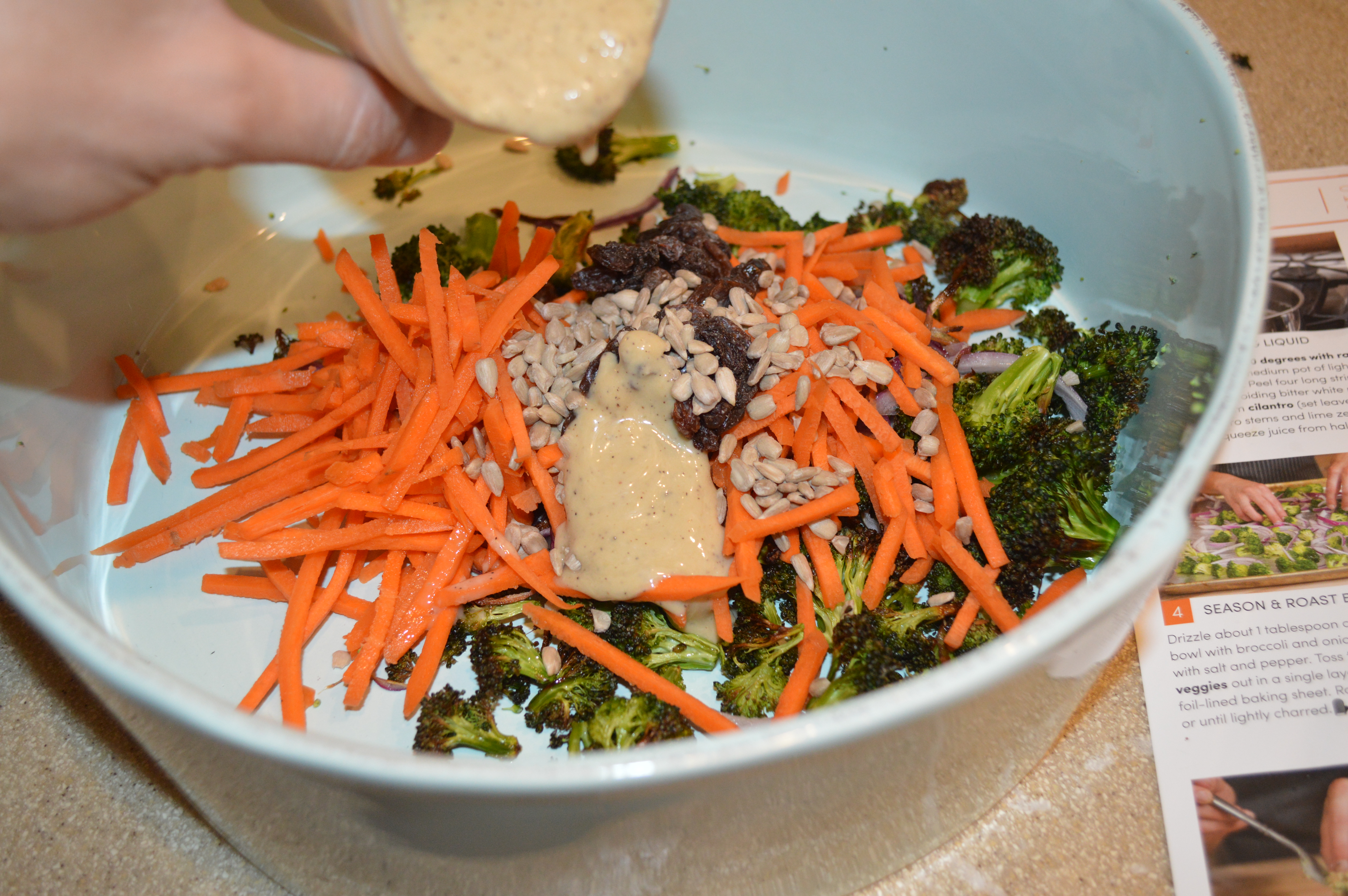 raisins, sunflower seeds and garlic hummus dressing