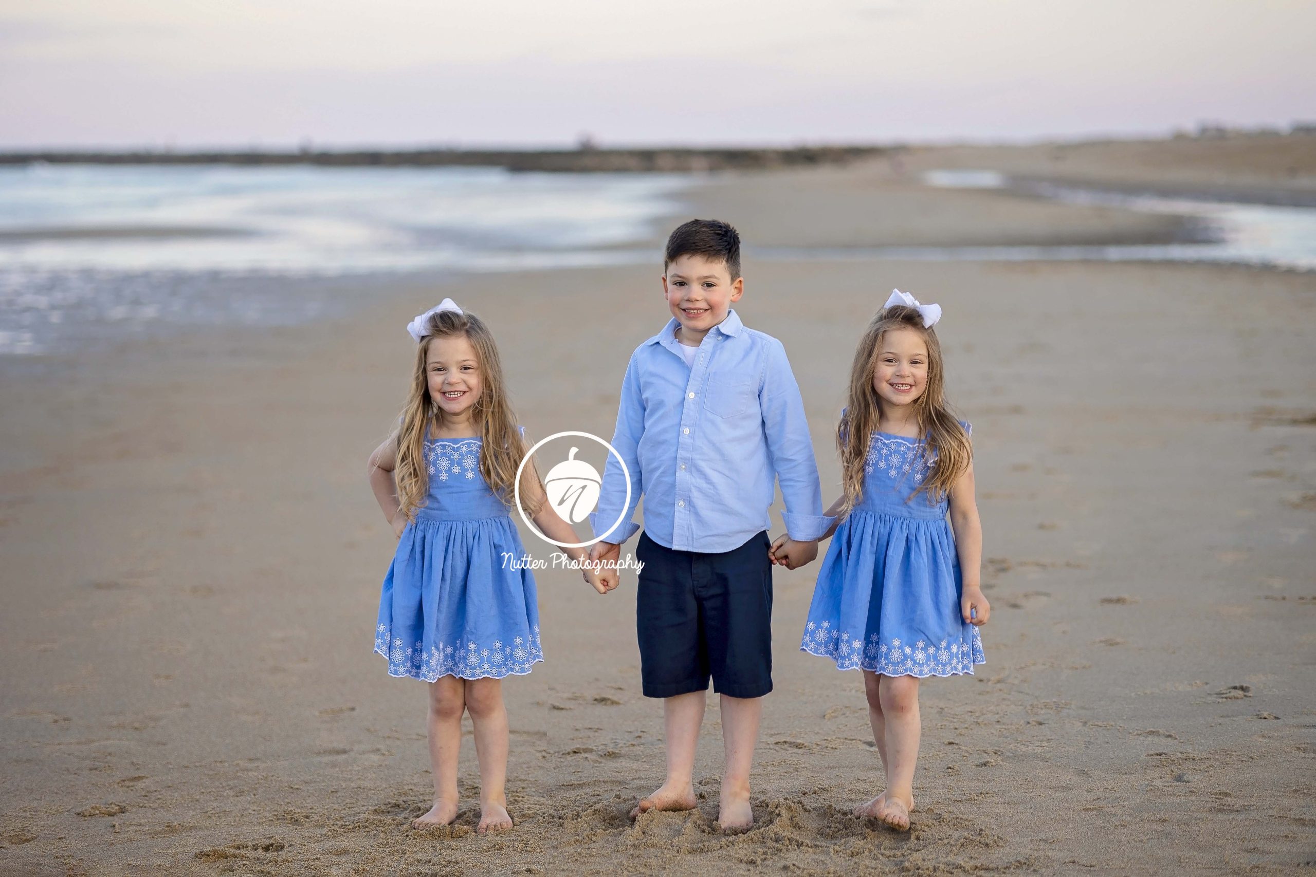 Sweet and sassy siblings picture at the beach