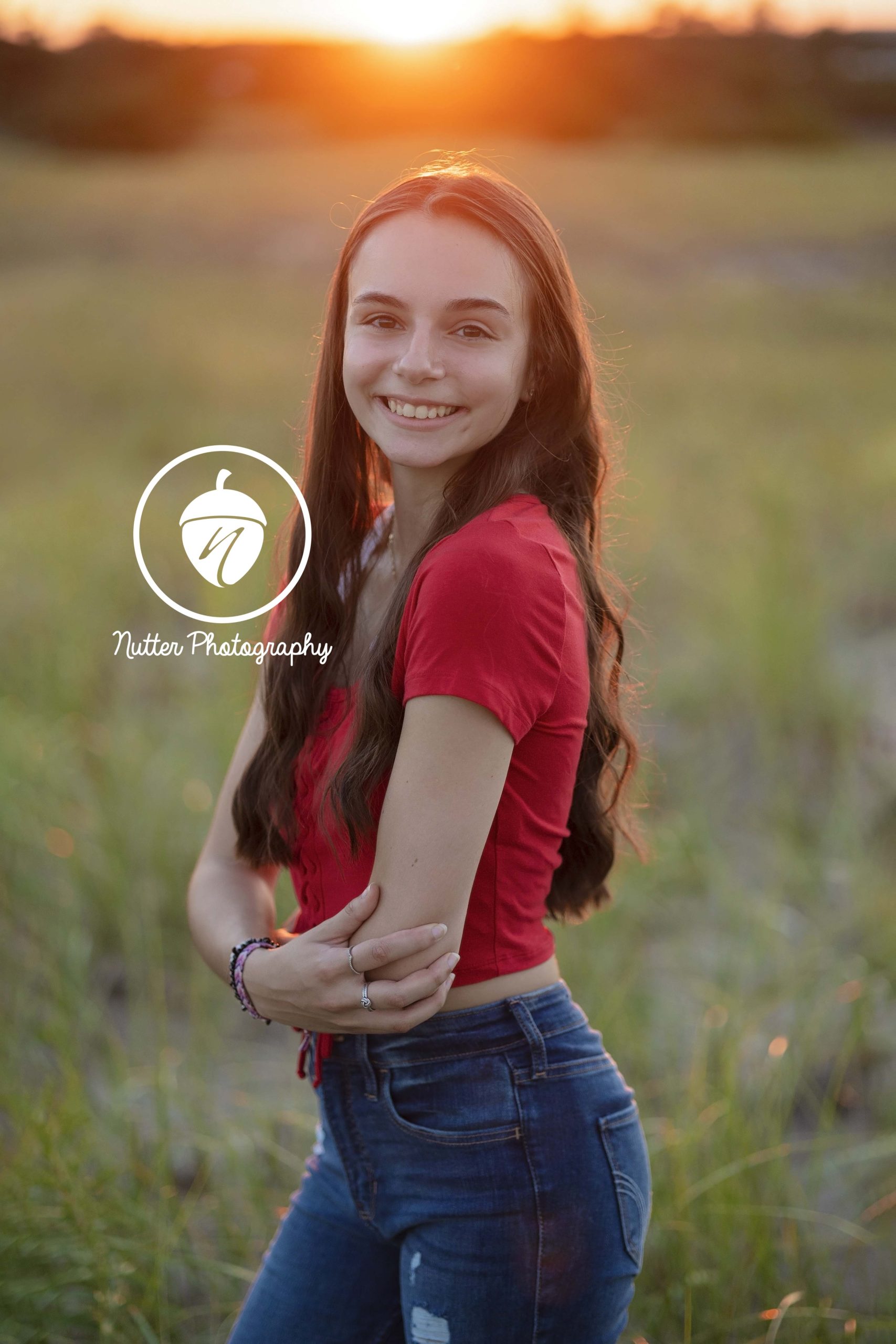 Senior pictures at Golden hour in beach grass