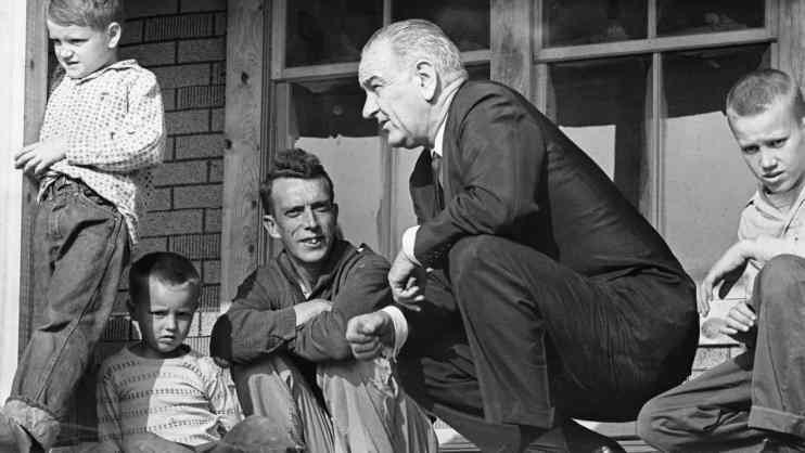 1960s era image of President Lyndon B Johnson visiting with American citizens