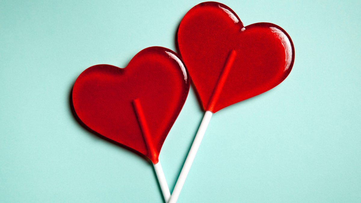 two heart-shaped lollipops