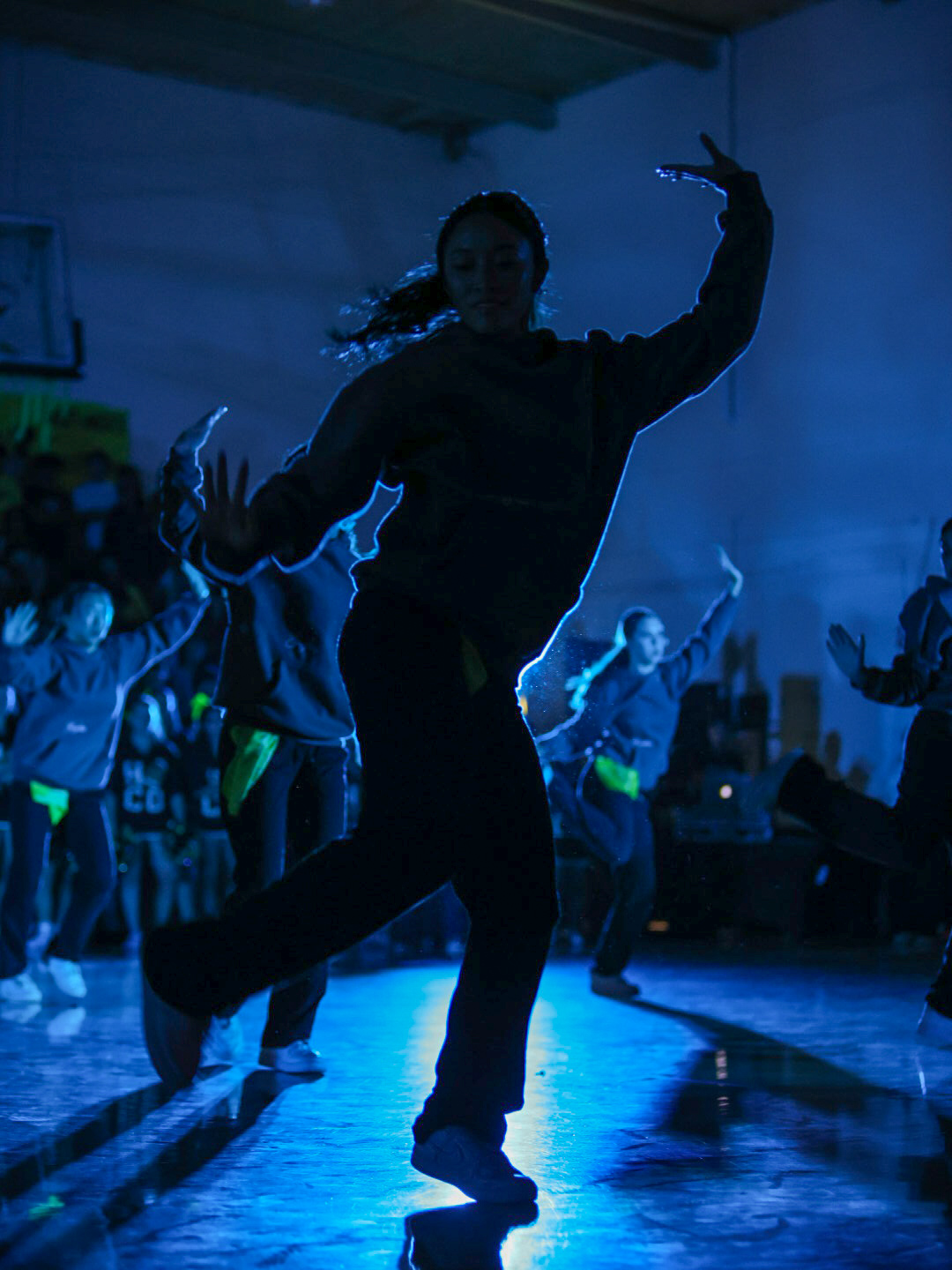 Taking center stage for the dance team's first rally performance of the year.