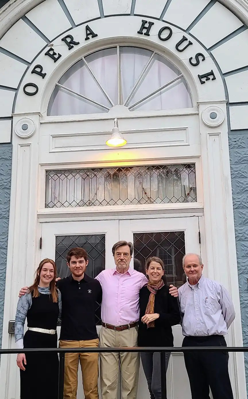 Town Run Theater Company members in front of opera house
