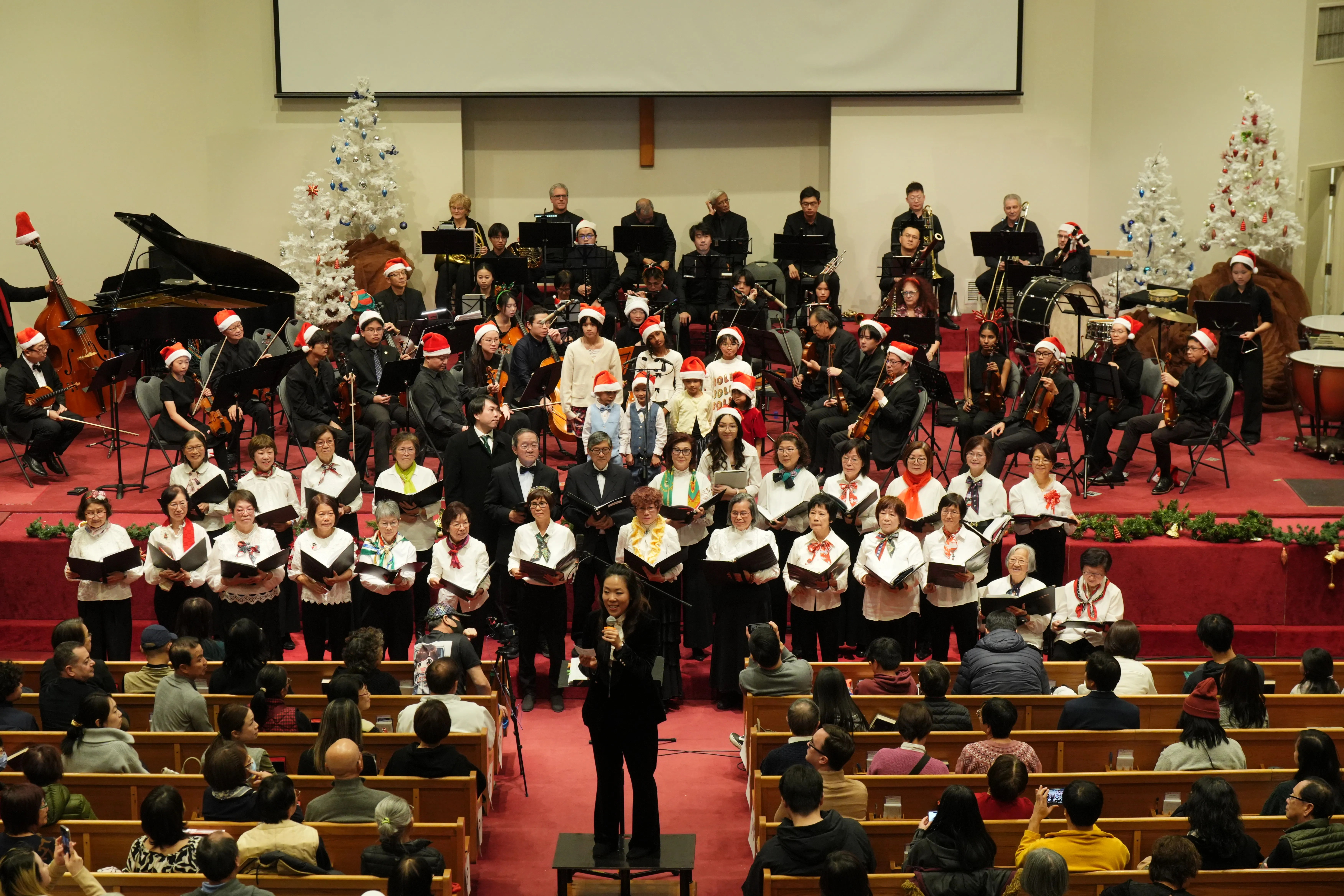 Children singing together in a choir rehearsal
