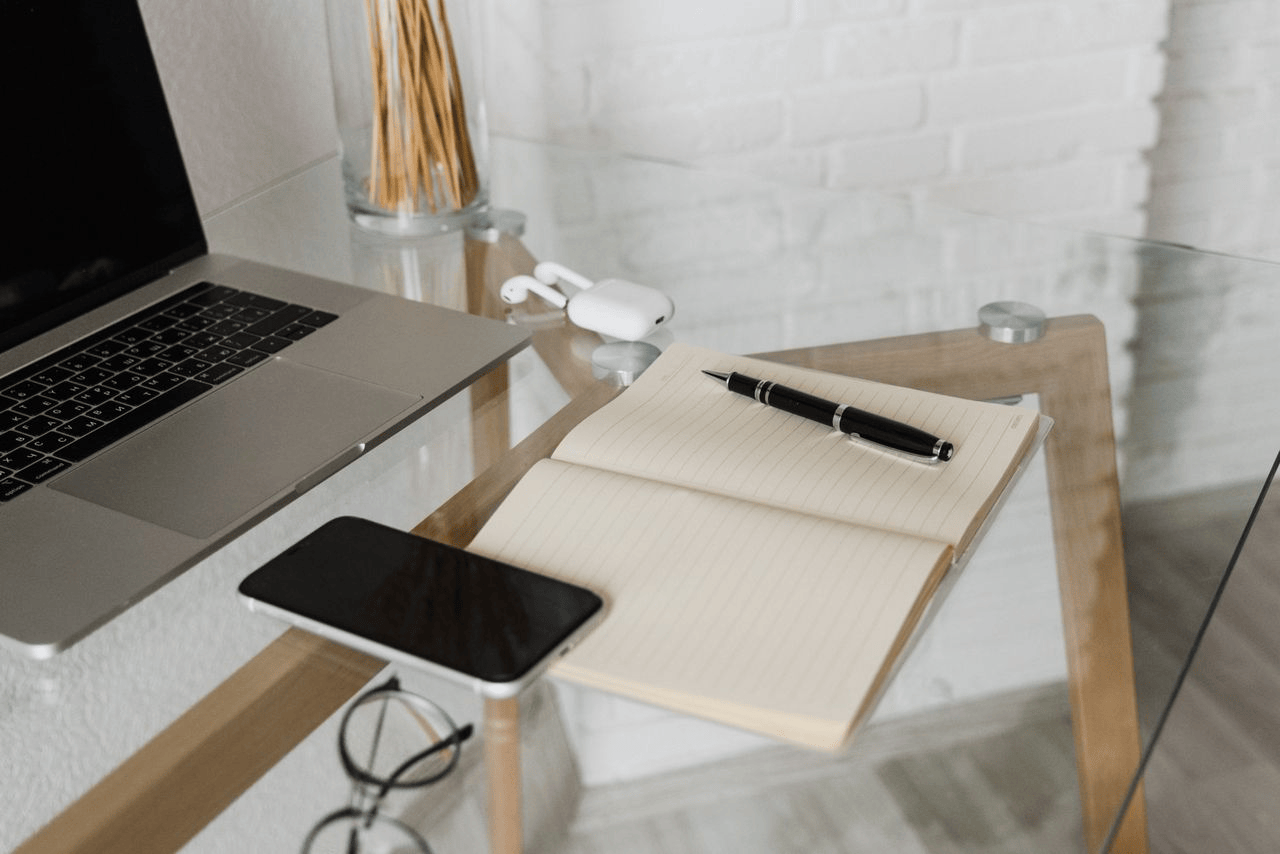 Freelance retainer pricing guide showing a professional business workspace