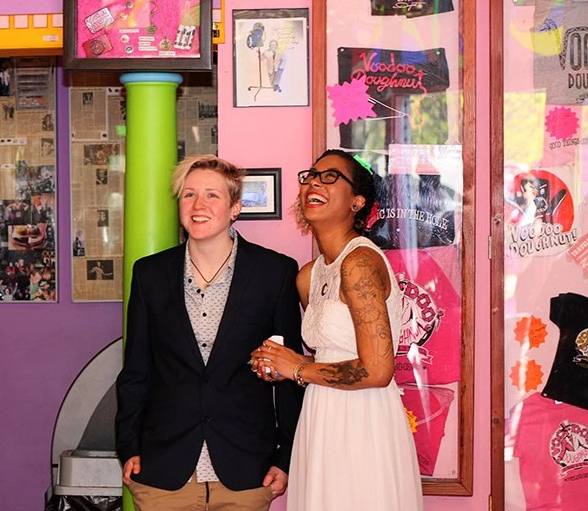 Ring Pops, donuts, and ladies in love at this Voodoo Donuts ceremony