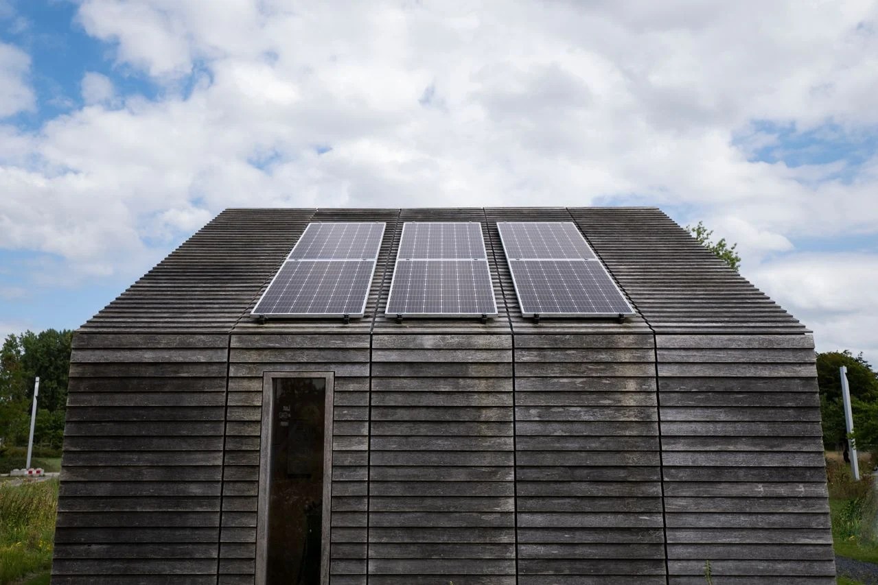 Solar Panels on a weathered wooden structure.