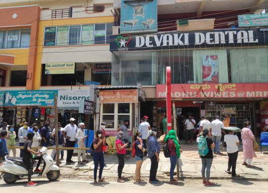 women alcohol store queue